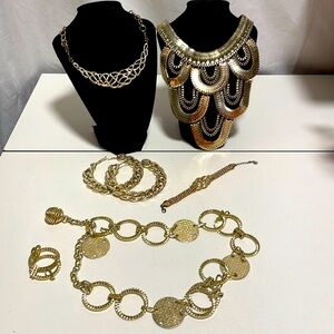 Gold colored costume jewelry mixed lot. Large hoop earrings